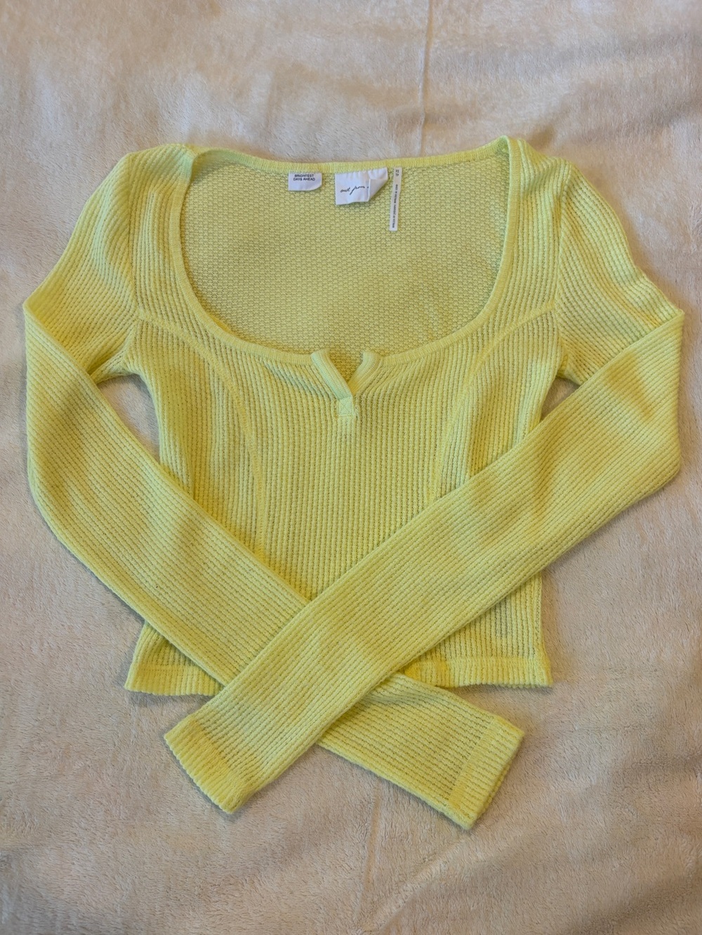 Urban Outfitters out from under light yellow ribbed knit cropped long sleeve top